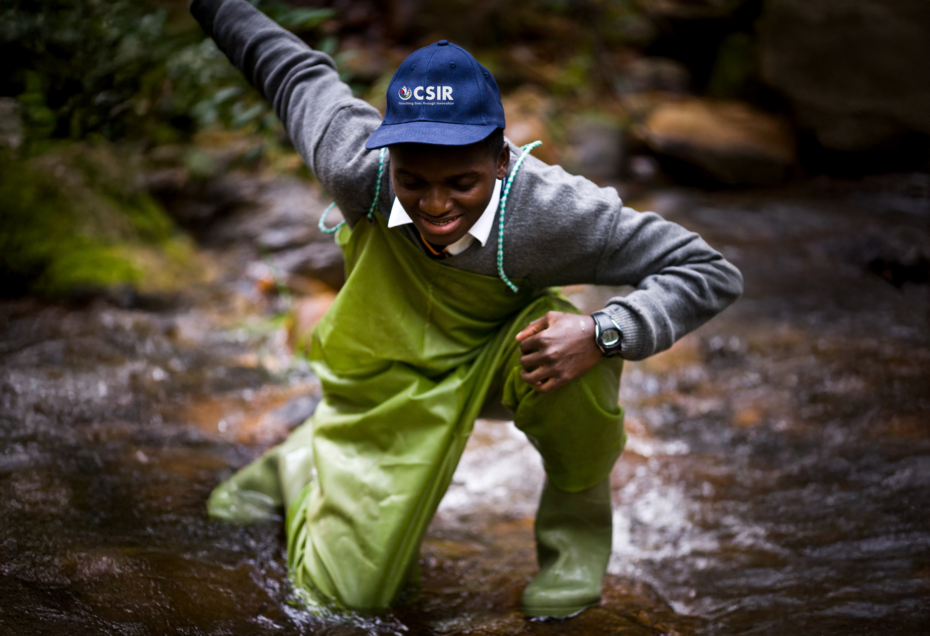 Person on their knees looking out