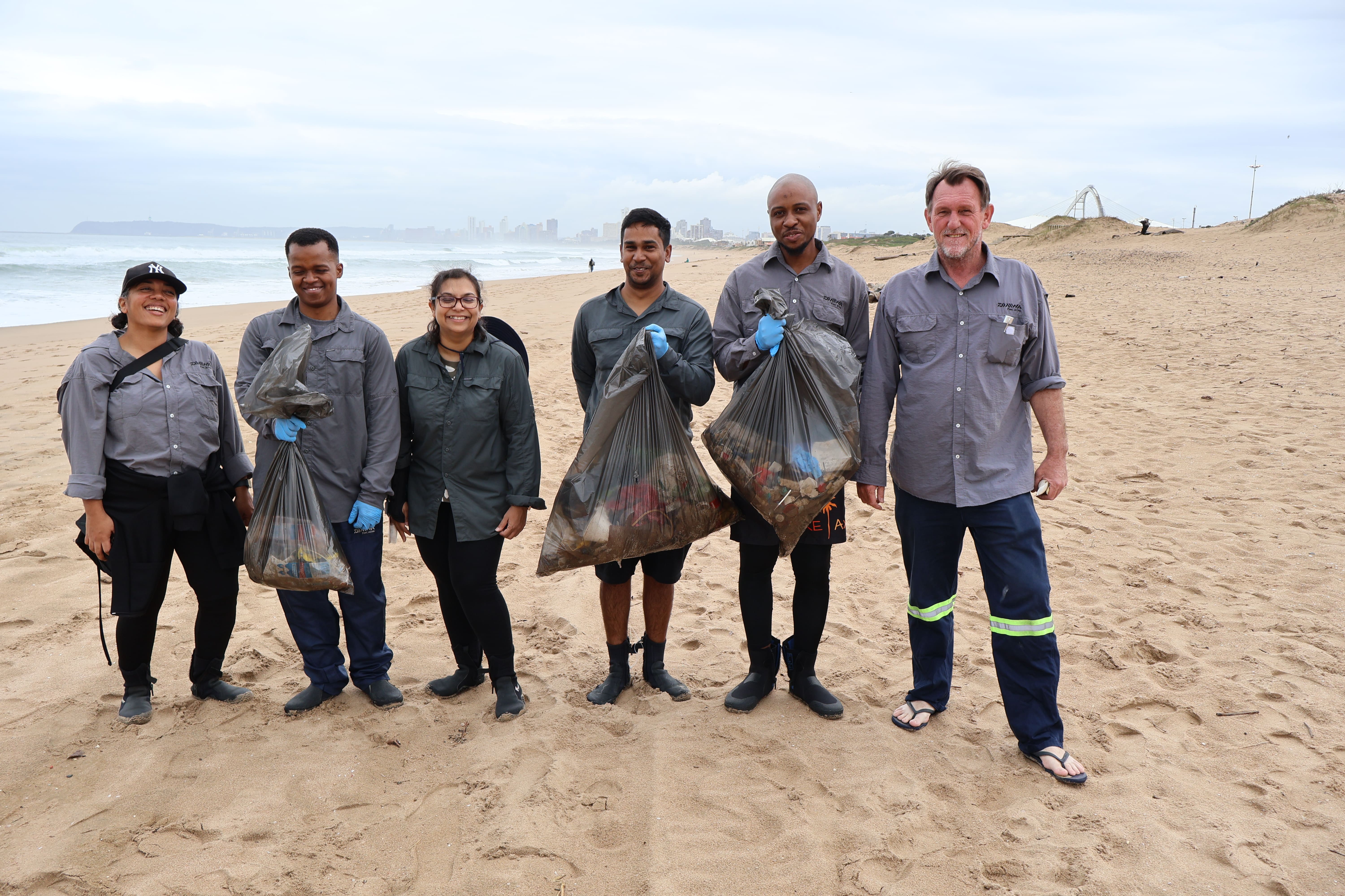 Group of people standing on the beach