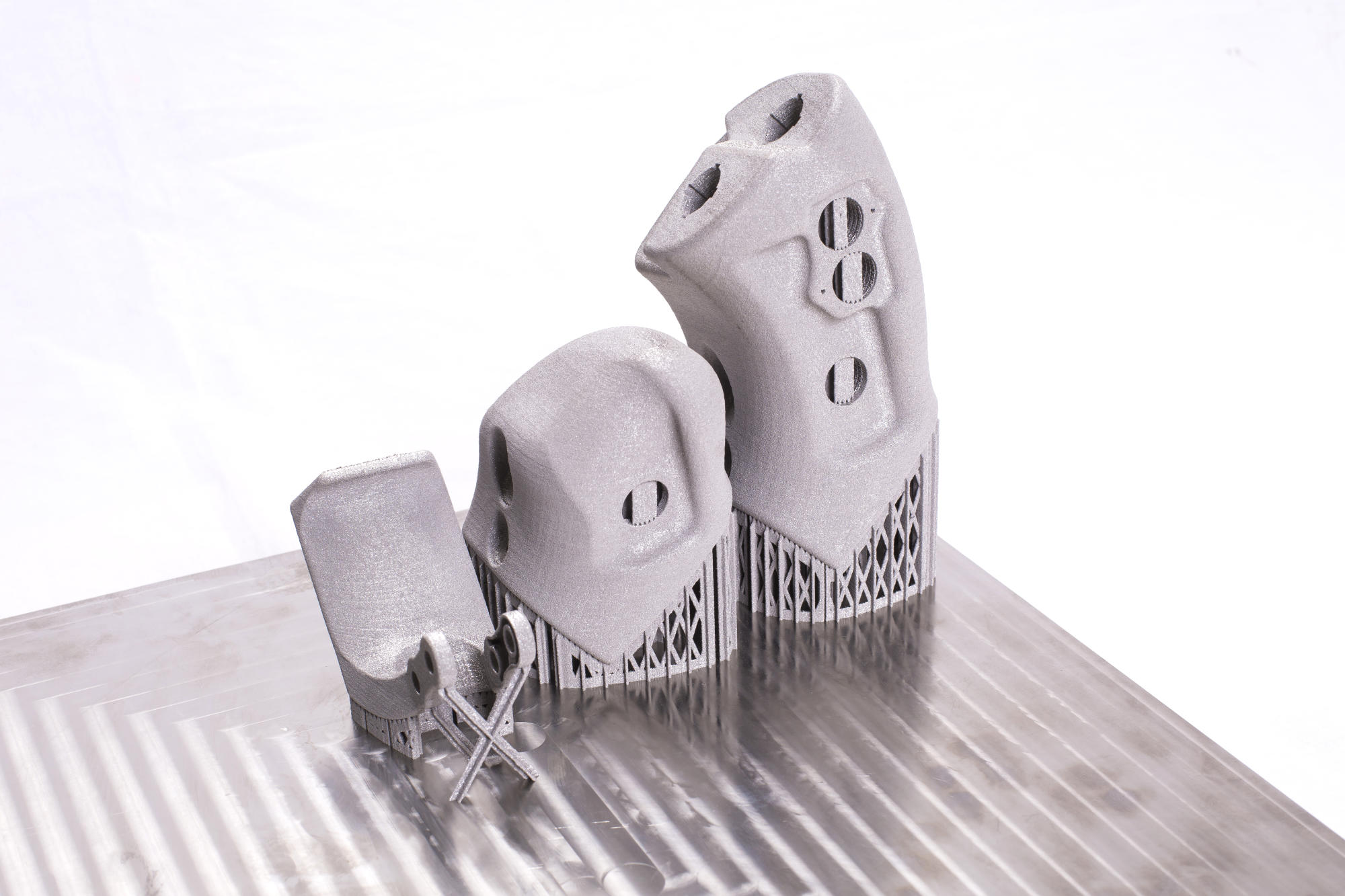 Hand holding a container with yellowish liquid