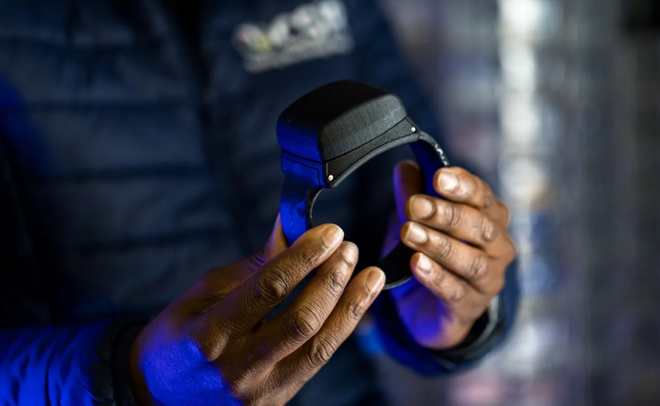 Person holding a bracelet