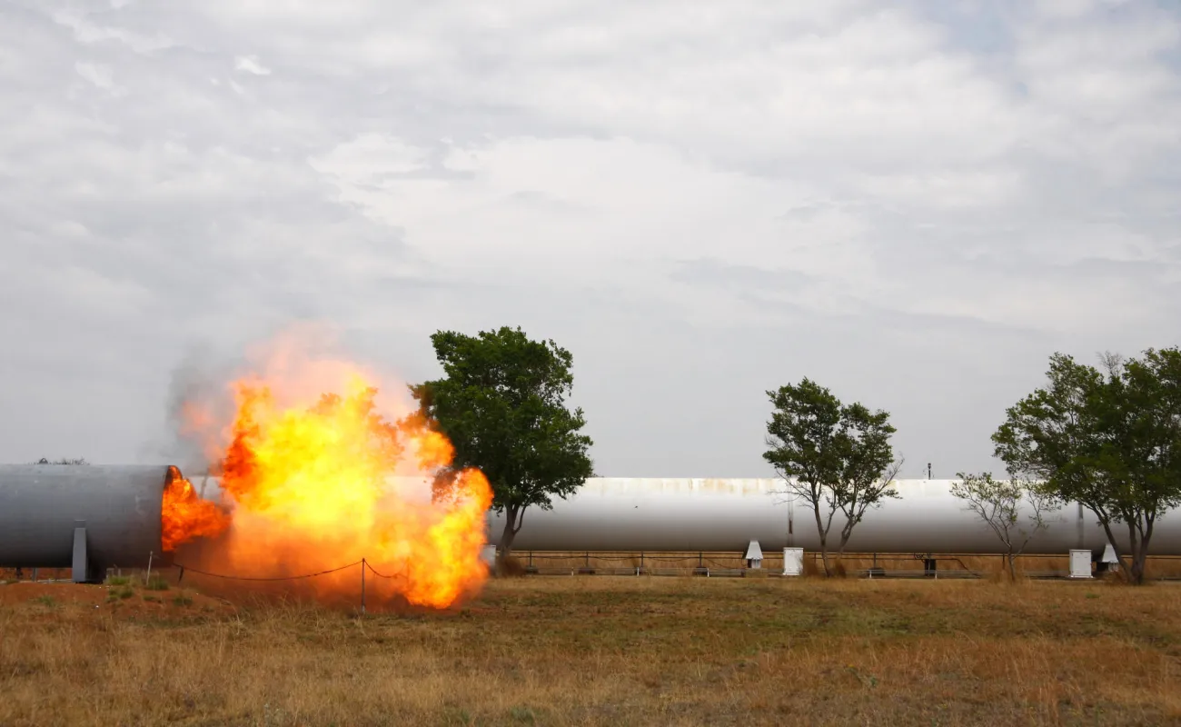 Technician measuring an item