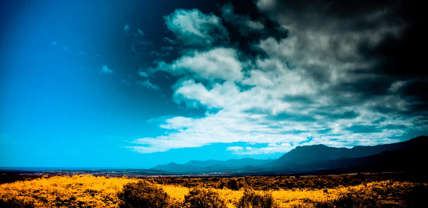 Sky with clouds and field 